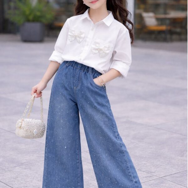 Bow white shirt/stoned blue jeans