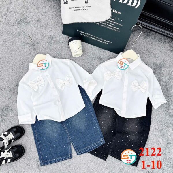 Bow white shirt/stoned black jeans