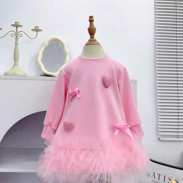 Pink net gown with bow/love design